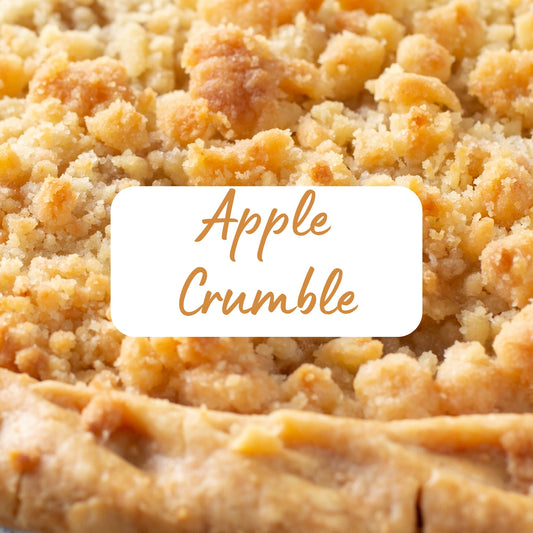 Close-up of an apple crumble dessert with a label indicating the type of dessert.