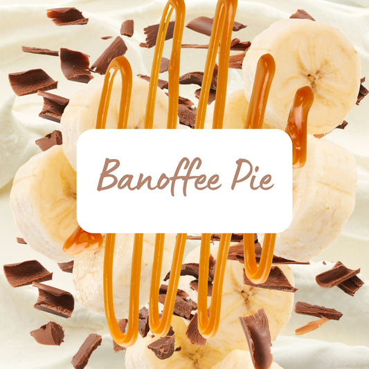 Banoffee pie with caramel drizzle, banana slices, and chocolate pieces on a white background.