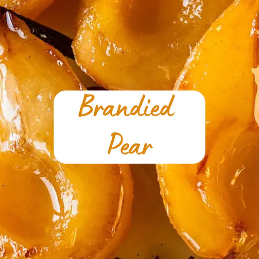 Close-up of brandied pears with a label in the center.